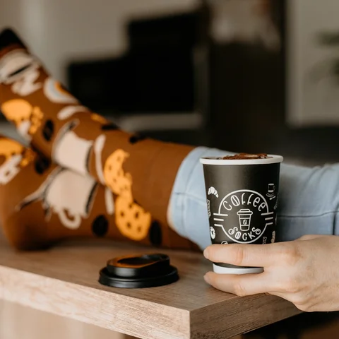 Coffee Socks | references - take away cups with customized branding | takeawaycup.eu